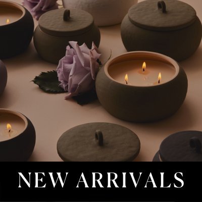 Cali candles arranges around a rose