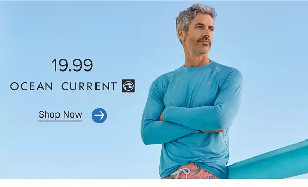 19.99 Ocean Current. Shop now. A man in a swimsuit and swim shirt.