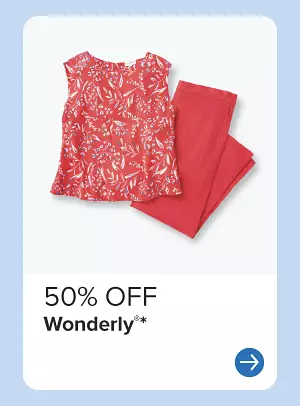 A woman's red top and pants. 50% off Wonderly.
