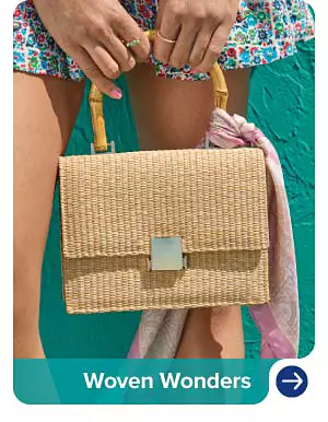 An image of a woman holding a woven bag. Woven wonders.