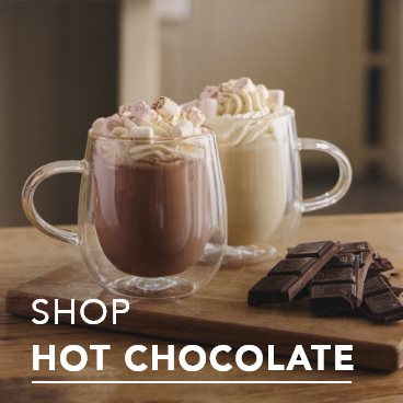 Shop Hot Chocolate text overlays image of two Hot Chocolate mugs