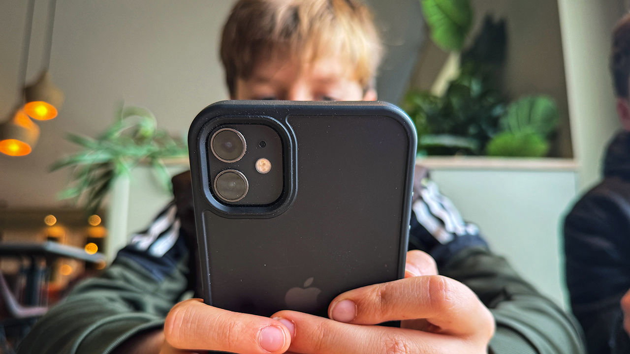 A 12-year-old boy looks at an iPad screen in Swansea, Wales on October 23rd 2023