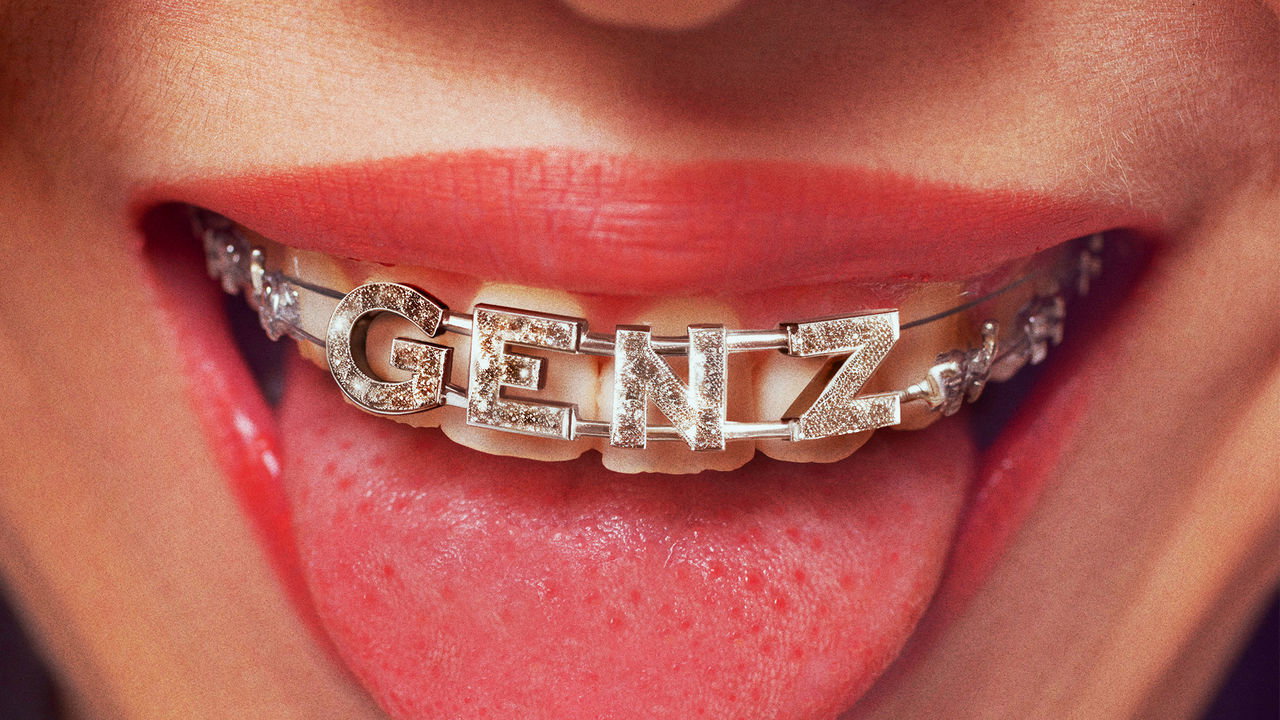 A teenager smiling with braces that spell 'Gen Z'