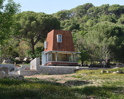 corten steel angular cabin emerges from pergamon forests in turkey