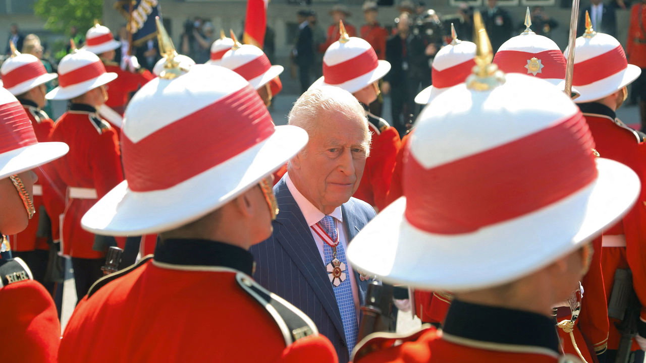 Britain's King Charles reviews the guard of honour as he arrives at the Senate of Canada Building in Ottawa, Ontario, Canada 