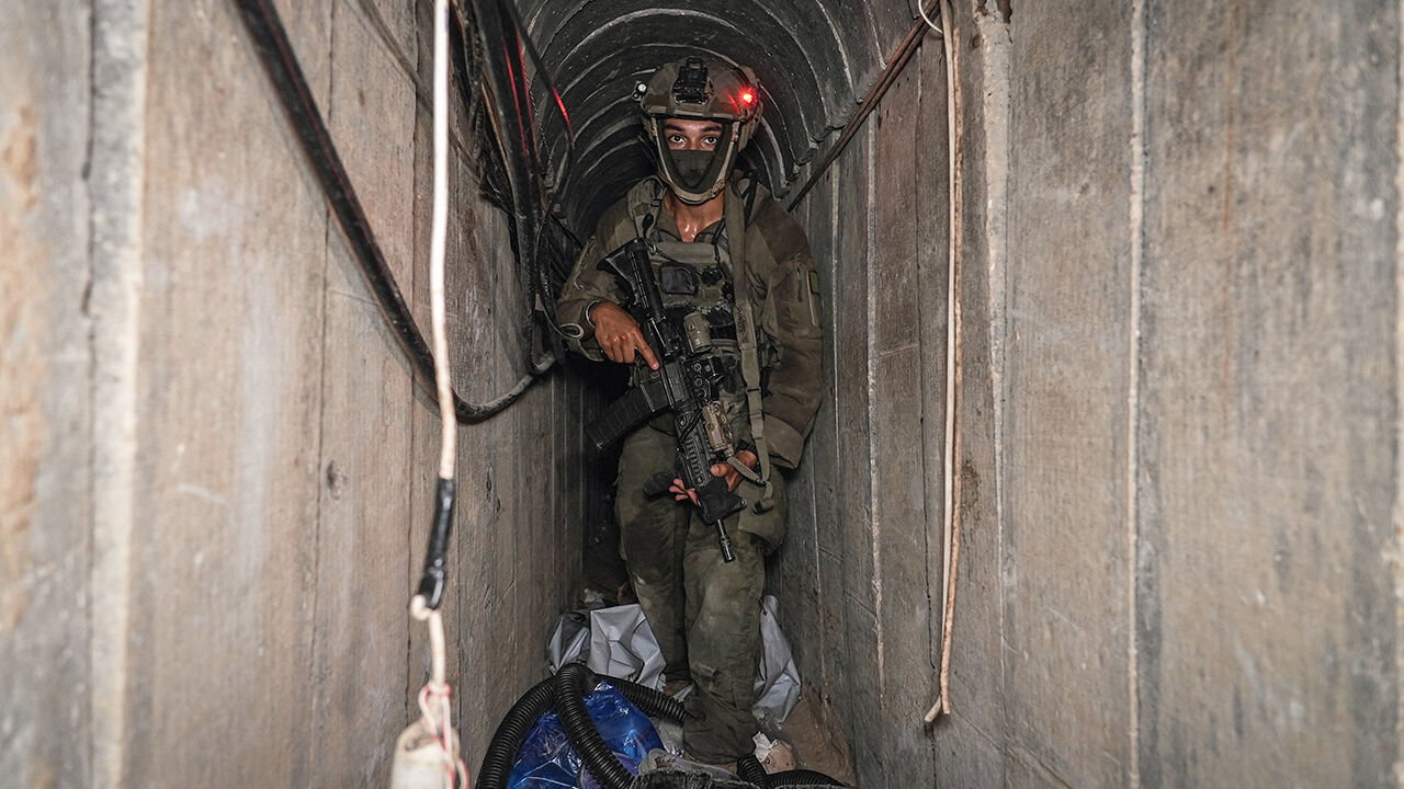 An Israeli soldier walks through a tunnel at the European Hospital in Khan Yunis in the Gaza Strip, June 8th 2025