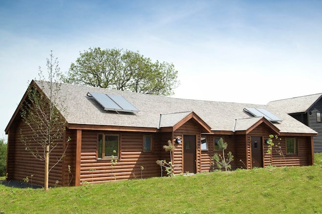 exterior of a classic lodge on a bright day