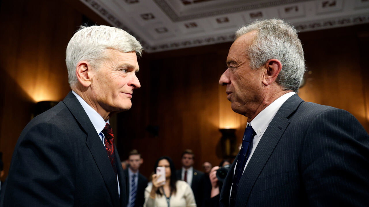  Robert F. Kennedy Jr. speaks with U.S. Sen. Bill Cassidy after testifying in his Senate Committee on Health, Education, Labor and Pensions confirmation hearing.