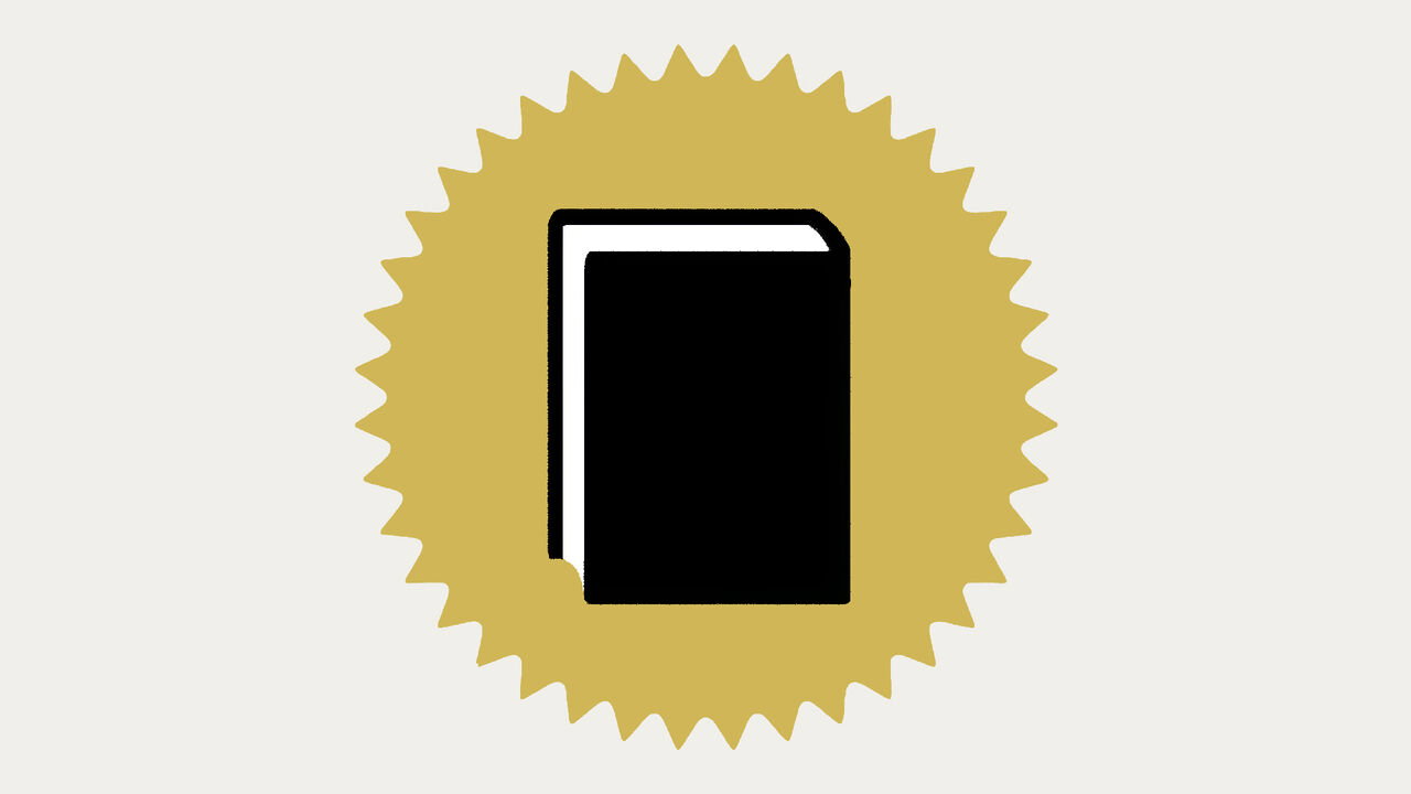 A black book on top of a yellow star sticker