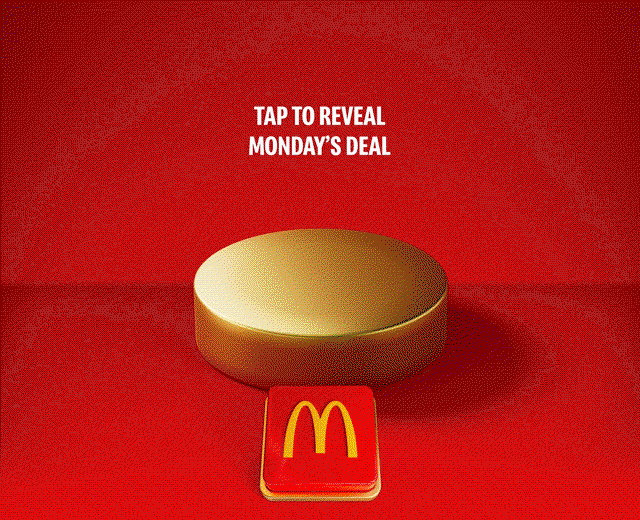 An appetising McDonald's meal sits on a gold plinth. Celebratory gold icons explode out. Text reads SAVE 10% WHEN YOU SPEND £12 ON FOOD OR DRINK