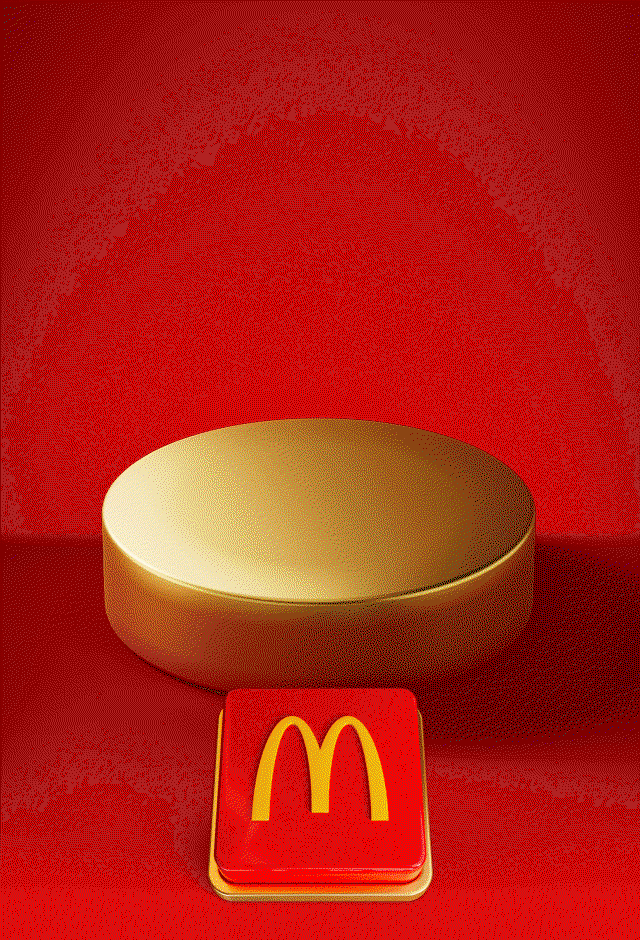 An empty gold plinth sits on a red background with a big red button beneath it. Text reads TAP TO REVEAL MONDAY'S DEAL