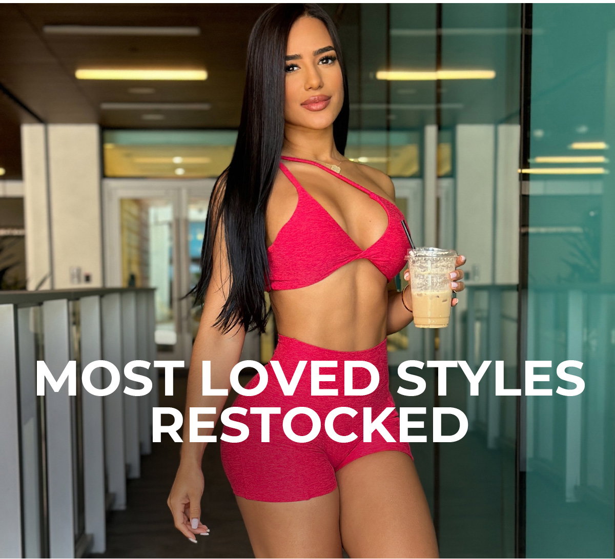 Lifestyle image of model wearing Twist Mini Bra Raspberry Punch