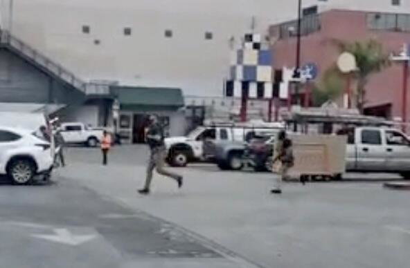 A screenshot from a video by a witness of an L.A. Home Depot raid.