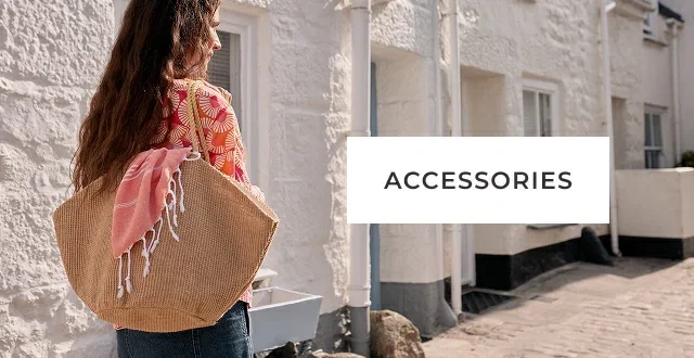 Image of model wearing a bag. Accessories.