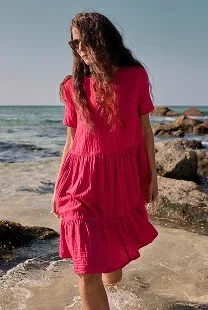 Image of model wearing the pebble comb organic cotton tiered dress