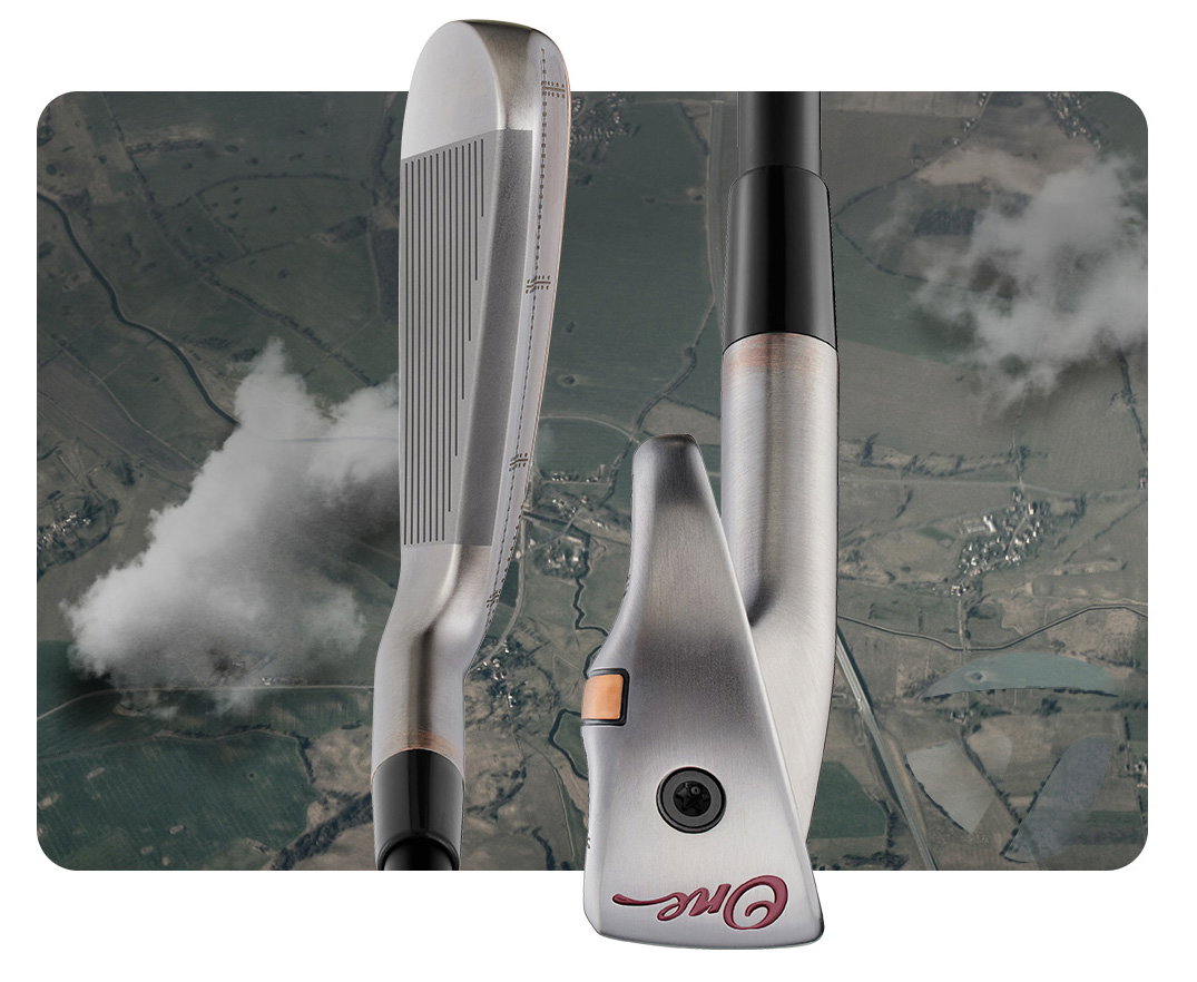 Side by side views of the P-UDI Bomber iron top view and tow on a terrain grid background with clouds 