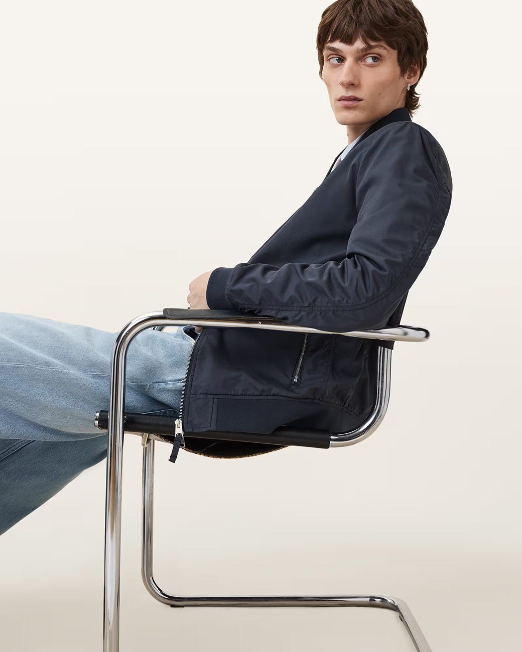 model wearing navy bomber