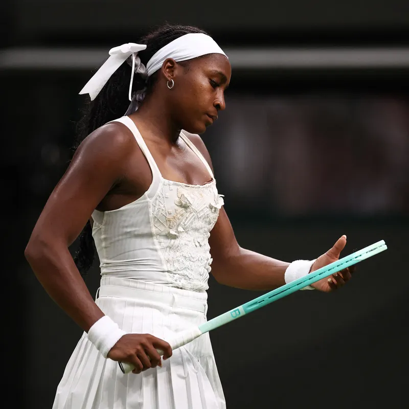 US player Coco Gauff reacts as she plays against Ukraine's Dayana Yastremska during their women's singles first round tennis match on the second day of the 2025 Wimbledon Championships at The All England Lawn Tennis and Croquet Club in Wimbledon, southwest London, on July 1, 2025. (Photo by HENRY NICHOLLS / AFP) / RESTRICTED TO EDITORIAL USE (Photo by HENRY NICHOLLS/AFP via Getty Images)