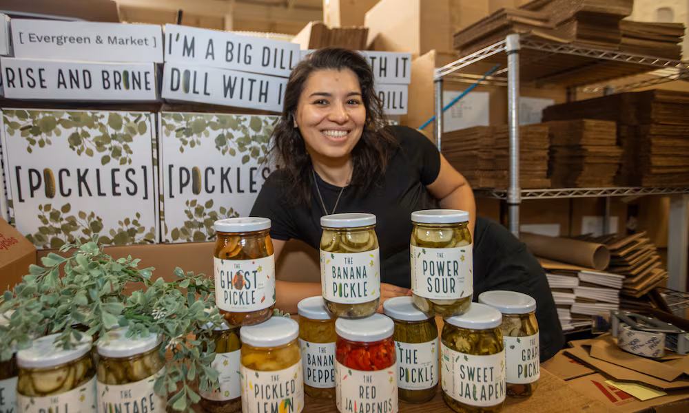 Salwa Kisswani owns and operates Evergreen and Market and is with a few of her variety of pickles at her Tucker warehouse.
