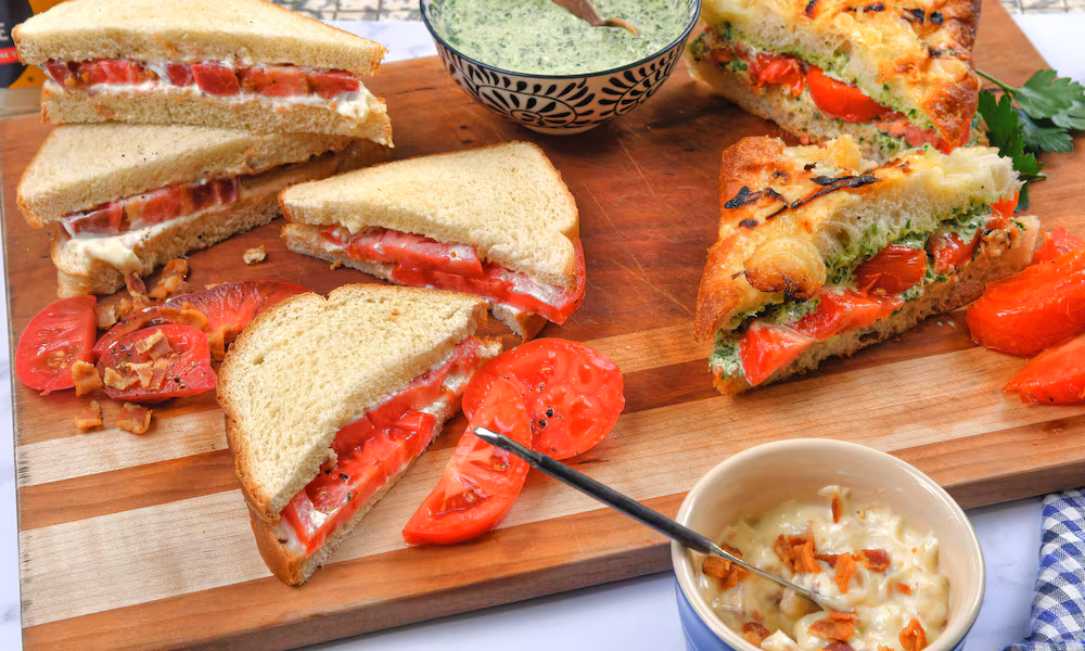 Put a new spin on an old summer favorite with an Heirloom Tomato Sandwich with Bacon Mayonnaise (left side upper), an Improved Classic Tomato Sandwich (left side lower) and a Grilled Tomato and Chimichurri Sandwich (right side).