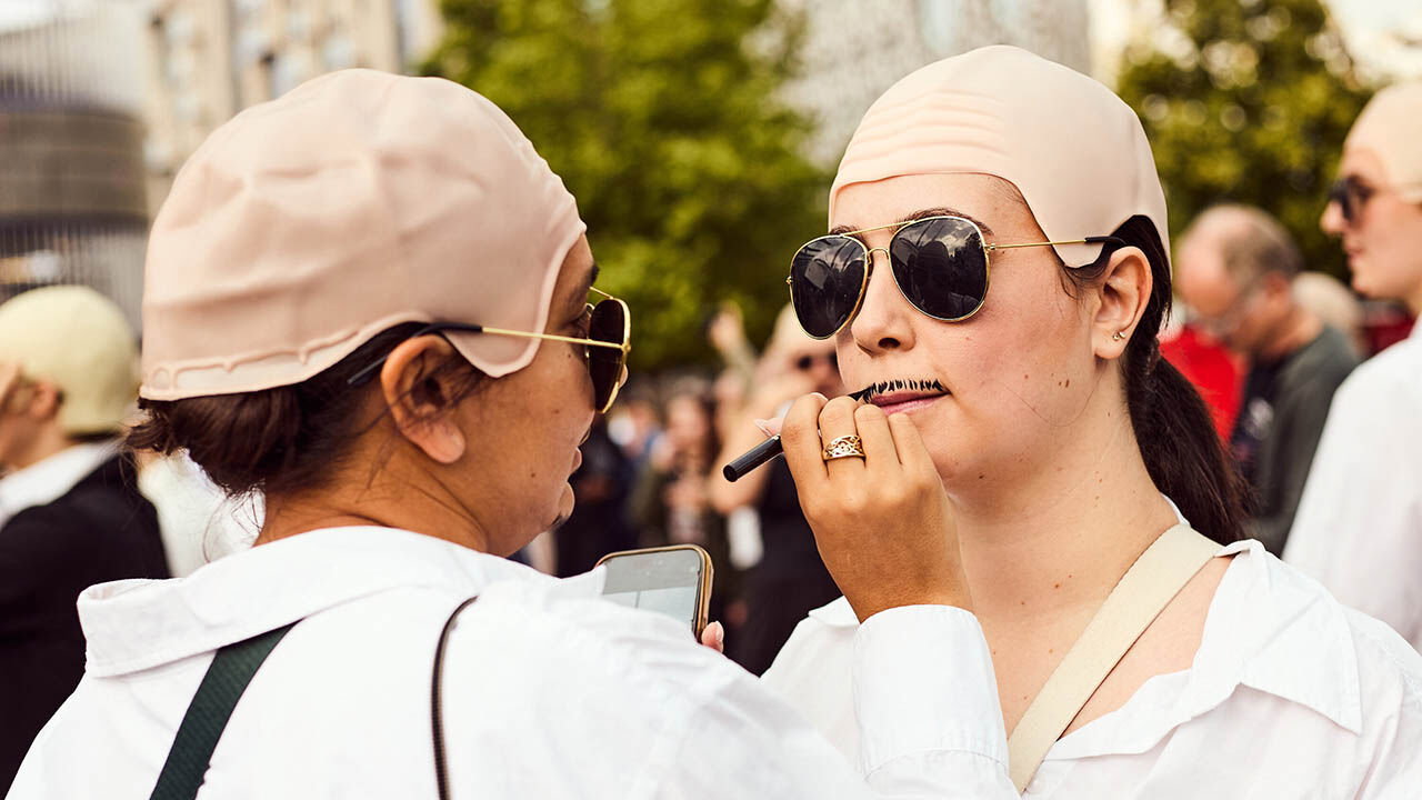 Fans get ready ahead before a Pitbull concert in London, United Kingdom on June 10th 2025