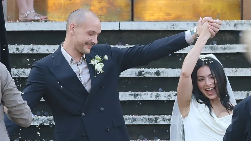 Charli XCX has quietly tied the knot with long-time boyfriend George Daniel in a hush-hush ceremony at Hackney Town Hall.The Boom Clap singer, 32, said 'I do' in front of just 20 close friends and family at the low-key London ceremony, keeping it miles away from the usual showbiz razzle-dazzle. The pair even walked to the venue! The 1975 were in attendance, apart from lead singer Matty Healy.