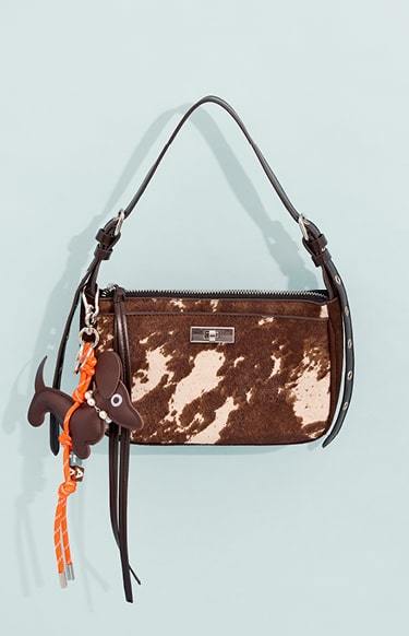 Shoulder bag with leather
