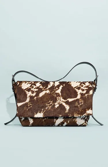 Shoulder bag in leather with fur
