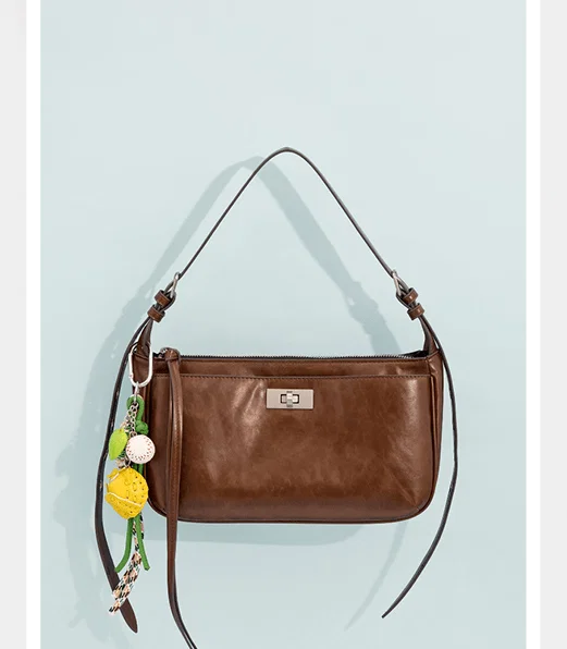Brown shoulder bag with studded strap M