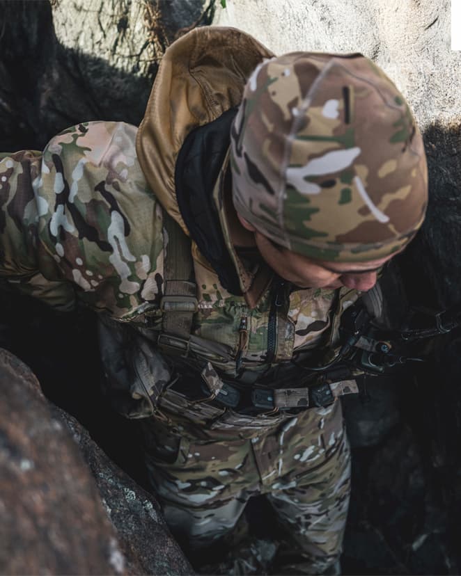 RECCE wearing Beyond Clothing in a mountain side.