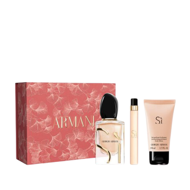 A Giorgio Armani "Sì" gift set on a white background, featuring a pink box with a silver "ARMANI" logo and ginkgo leaf pattern, alongside a "Sì" perfume bottle, a "Sì" travel spray, and a "Sì" soft perfumed hydrating smoothing body lotion tube
