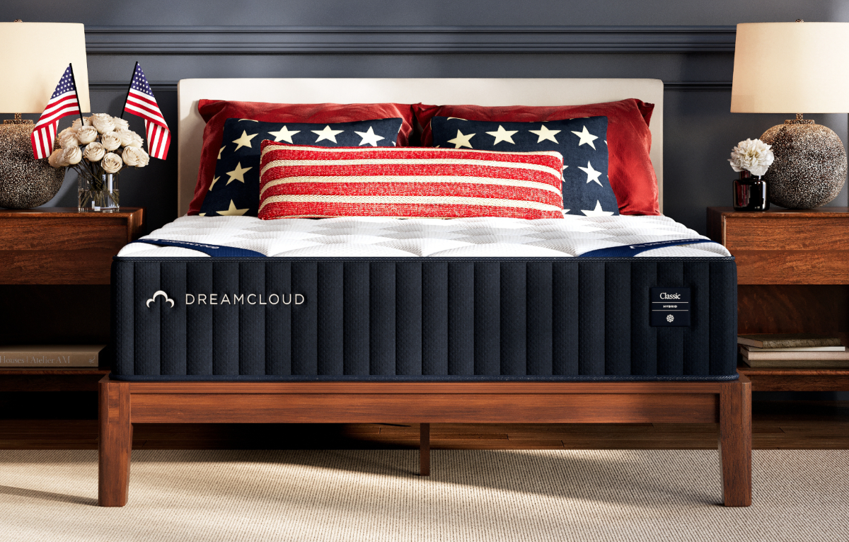 a bed with a dreamcloud mattress on it