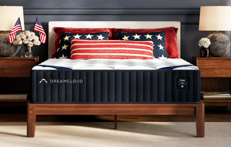 a bed with a dreamcloud mattress on it