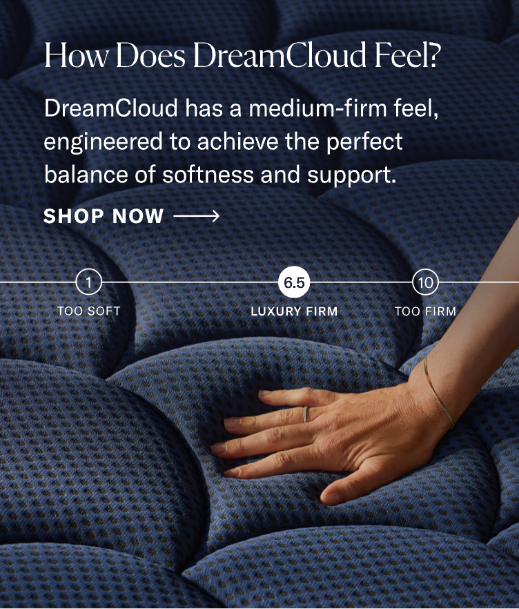 a person 's hand is on a blue mattress that says how does dreamcloud feel