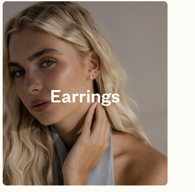 “Portrait of model wearing Caitlyn Minimalist hoop earrings. Text overlay: Earrings.”