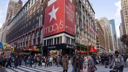 A corner billboard adjoining Macy's 34th Street flagship in New York