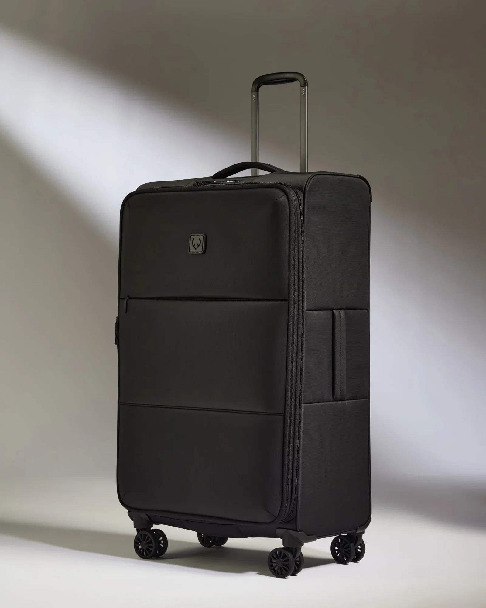 Image of Lightest Large Luggage in Black - Soft Stripe 2.0