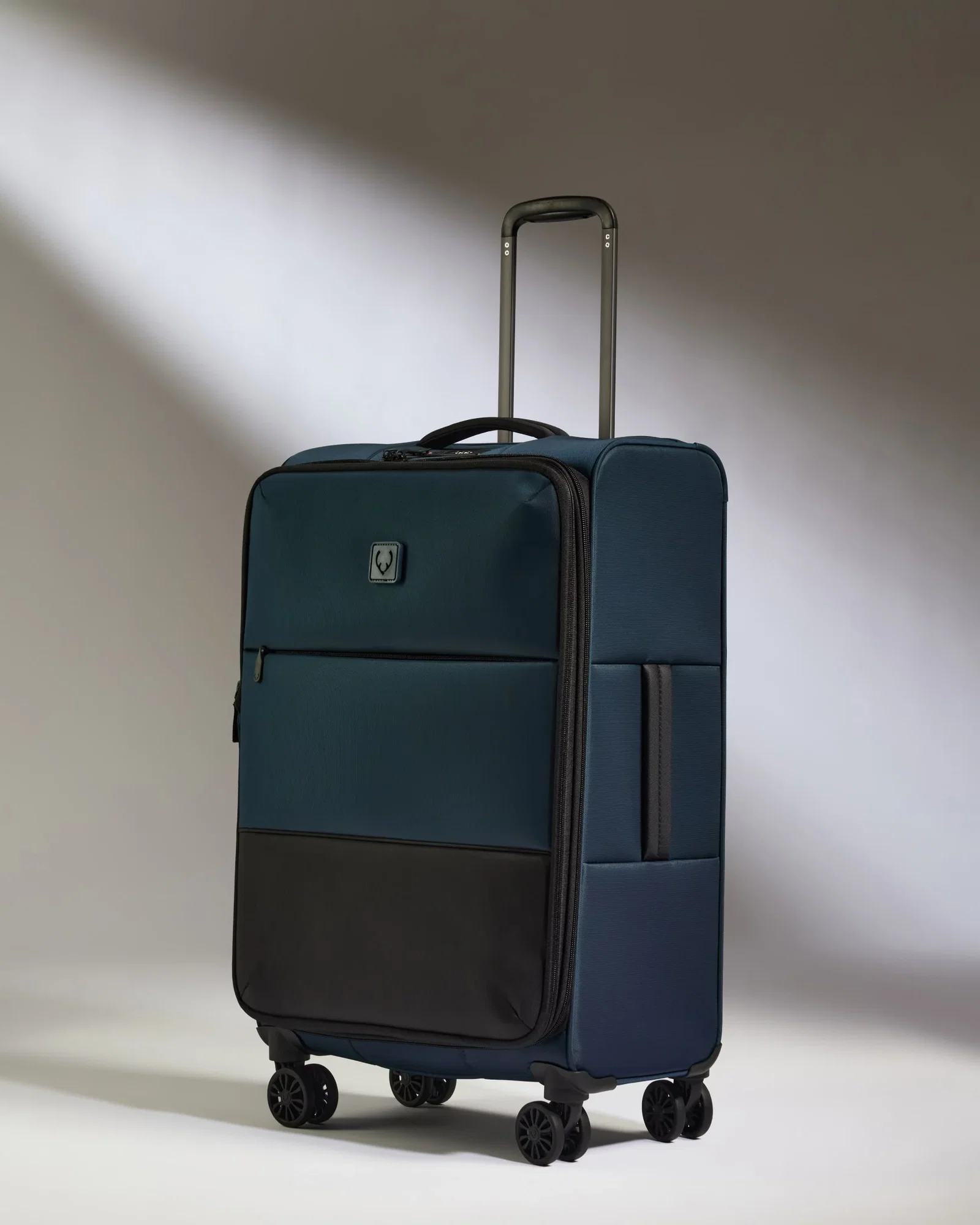 Image of Lightest Medium Luggage in Indigo Blue - Soft Stripe 2.0
