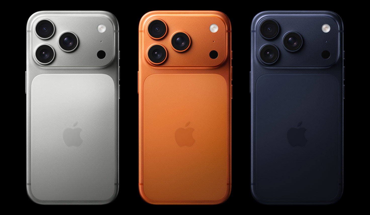 iPhone 17 Pro Max, back exterior, all three colors: silver, Cosmic Orange, and Deep Blue