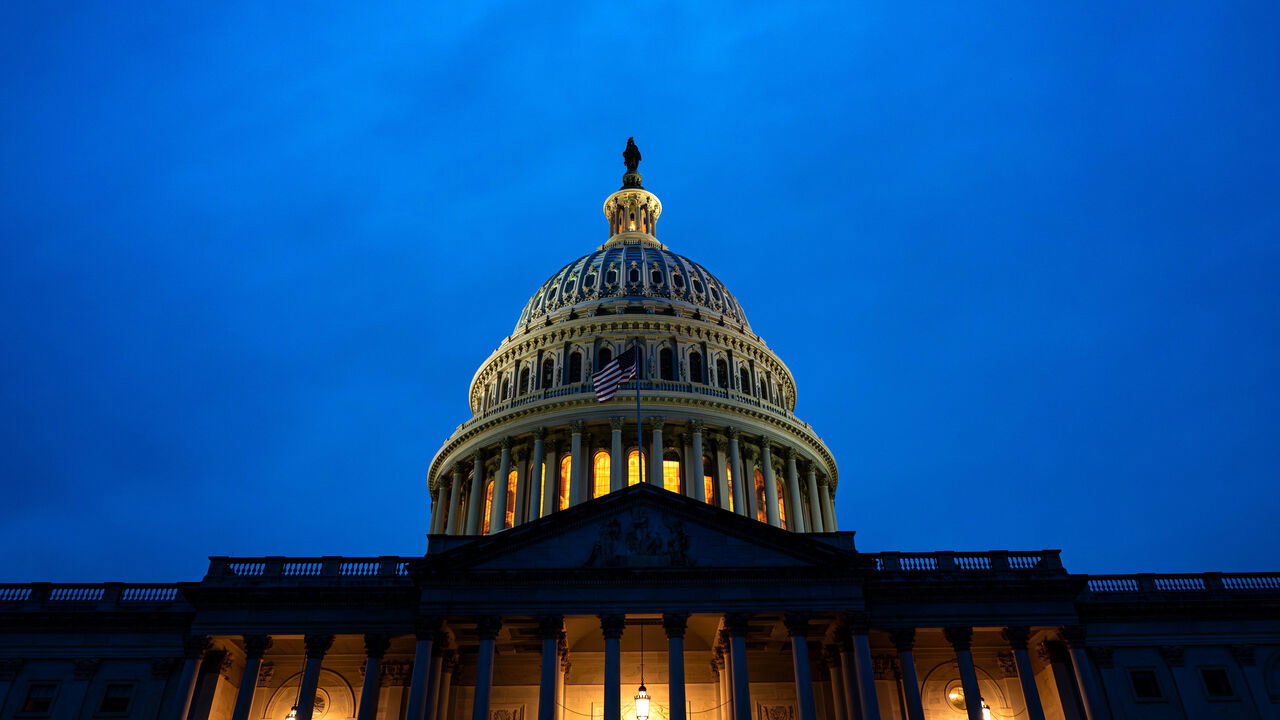 The US Capitol in Washington DC at sunset.