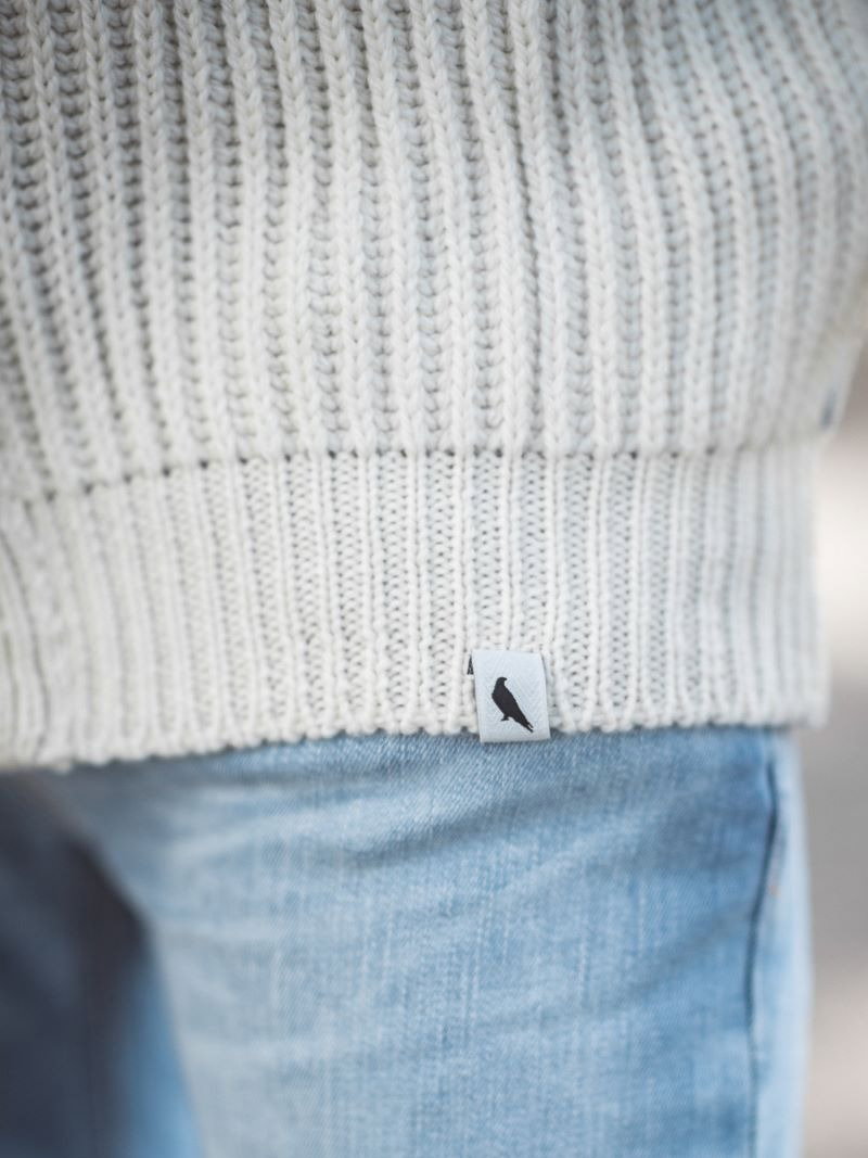 Wilkinson Cardigan by Peregrine in cream/ecru close up on label