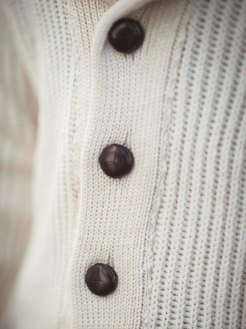Wilkinson Cardigan by Peregrine in cream/ecru close up on buttons