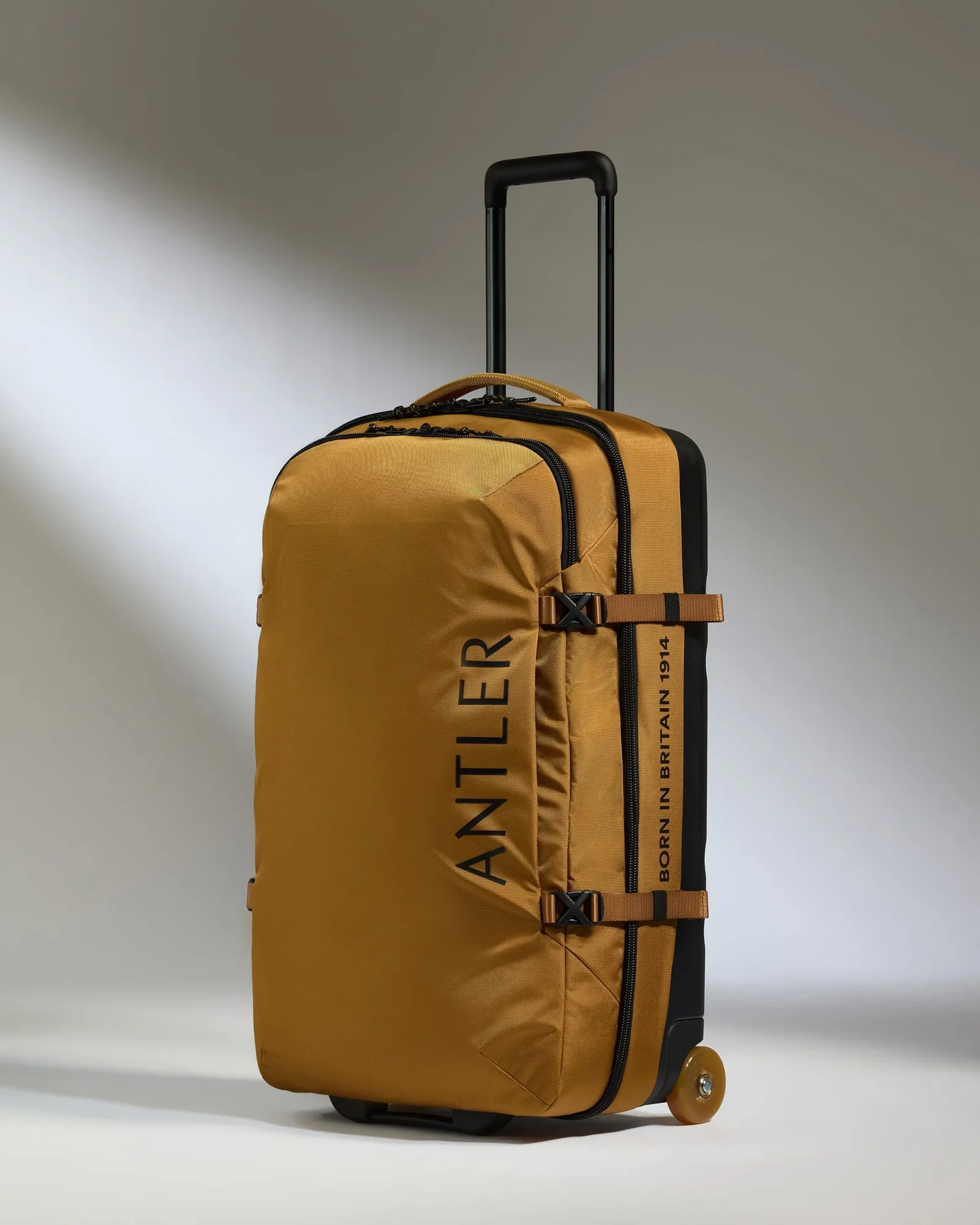Image of Discovery Wheeled Duffel in Mustard Yellow
