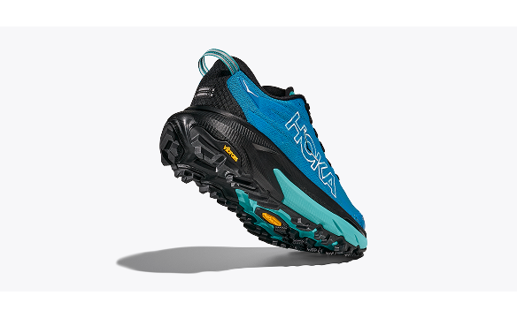 An angled side profile image showing the sole of the HOKA Mafate 5 trail running shoe in Skyward Blue / Black.