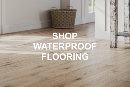 Caption: SHOP WATERPROOF FLOORING. Close-up of light blonde LVP flooring.