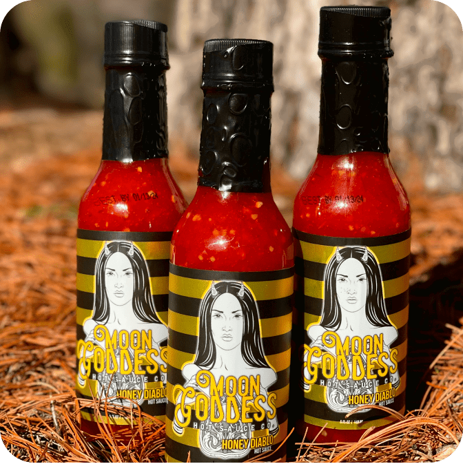 BOPP labels on bottles of hot sauce.