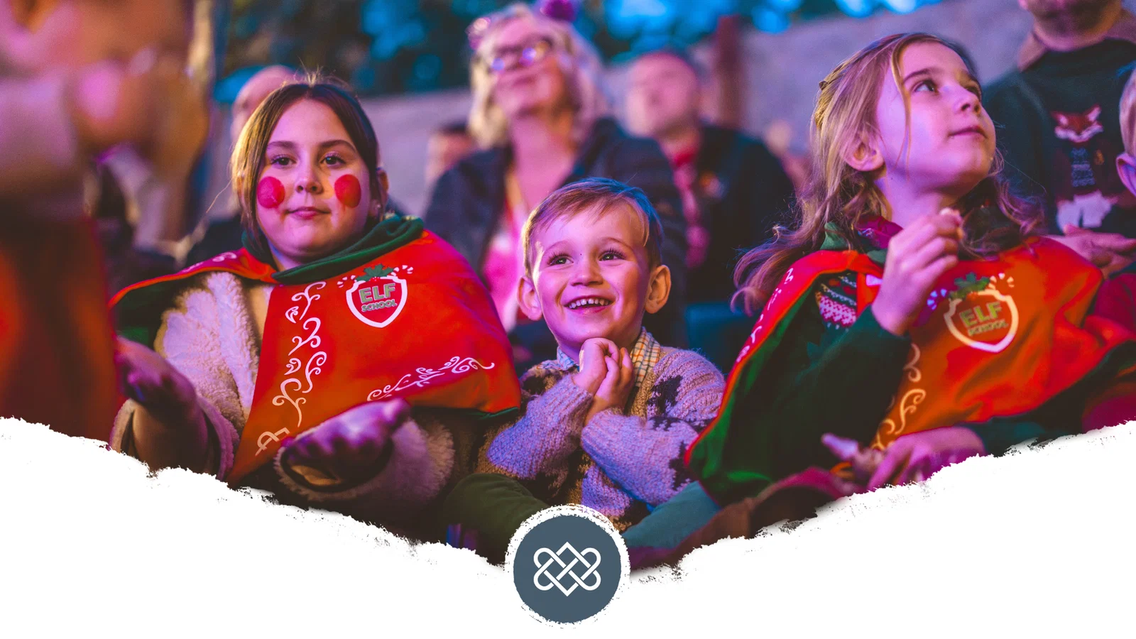 family enjoying Christmas show