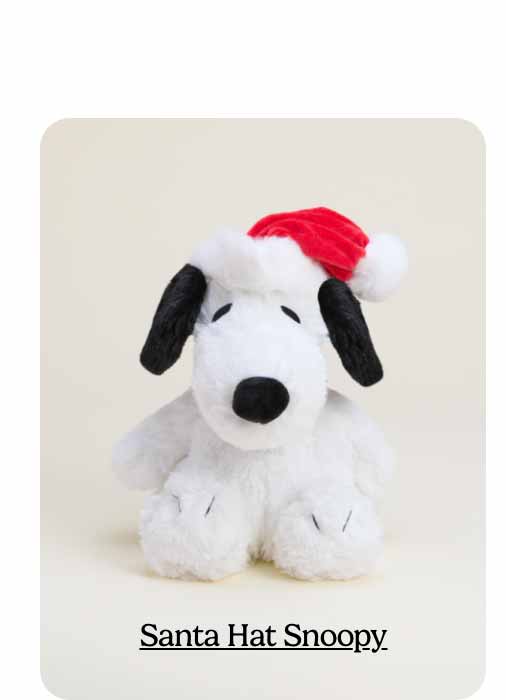 Santa Hat Snoopy Warmies on a beige background. Shop Now