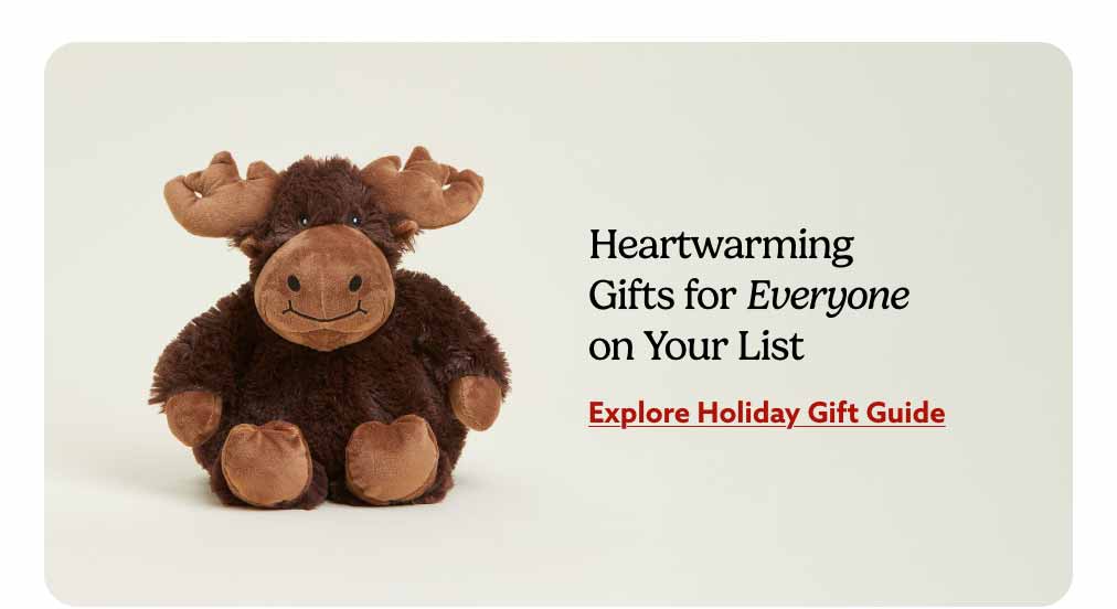 Moose Warmies on a beige background. Explore Holiday Gift Guide