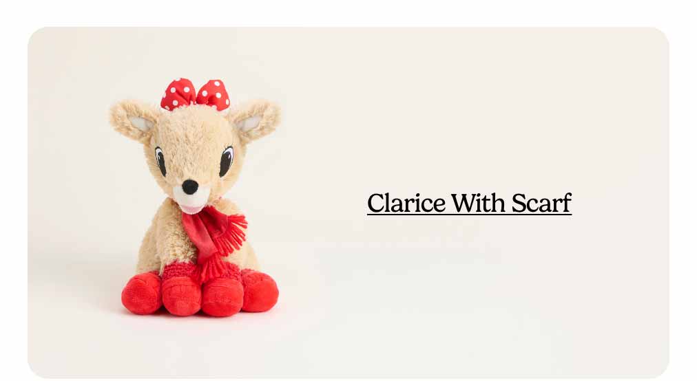 Clarice With Scarf Warmies on a beige background. Shop Now
